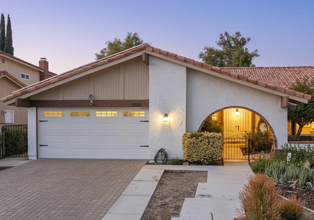Front view of Leisure Living Properties assisted living home in Agoura Hills, California, showing the entrance and exterior with warm evening lighting.