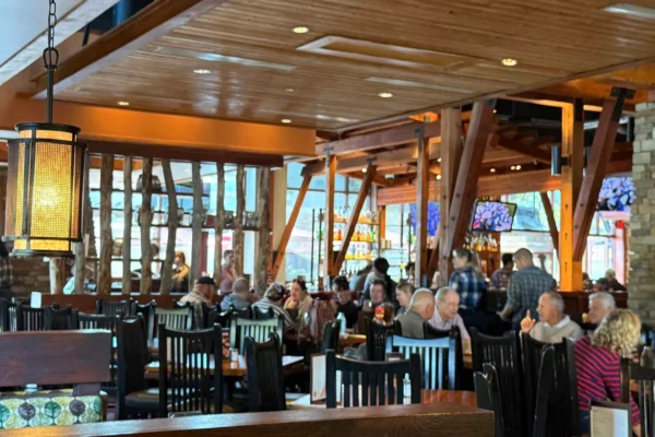 Cozy wooden interior of Lazy Dog Restaurant filled with guests dining